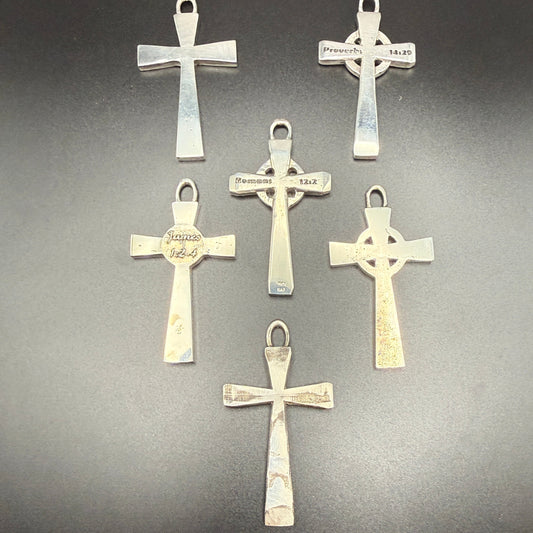 Collection of Saxon Crosses of different styles and finishes, and customizable text on front and back