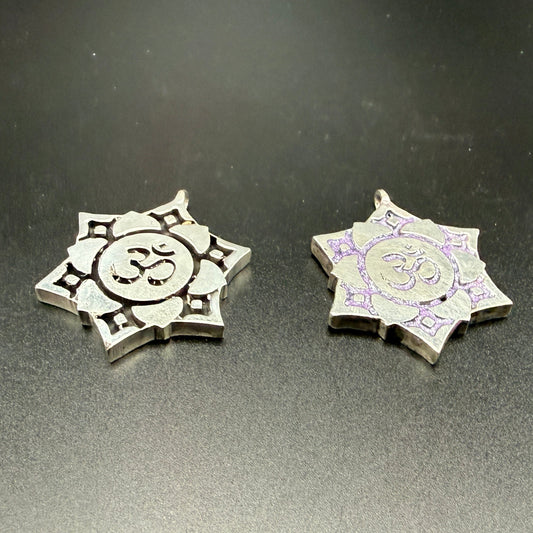 Two sterling silver Crown Chakra pendants