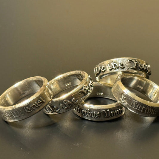 Collection of handmade embossed text in silver band with USA Patriot Theme