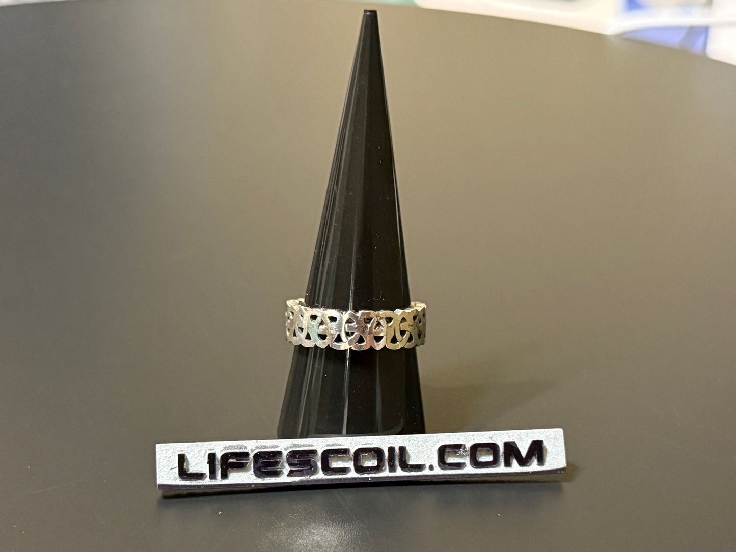 Handmade 5mm silver band with Celtic knot pattern