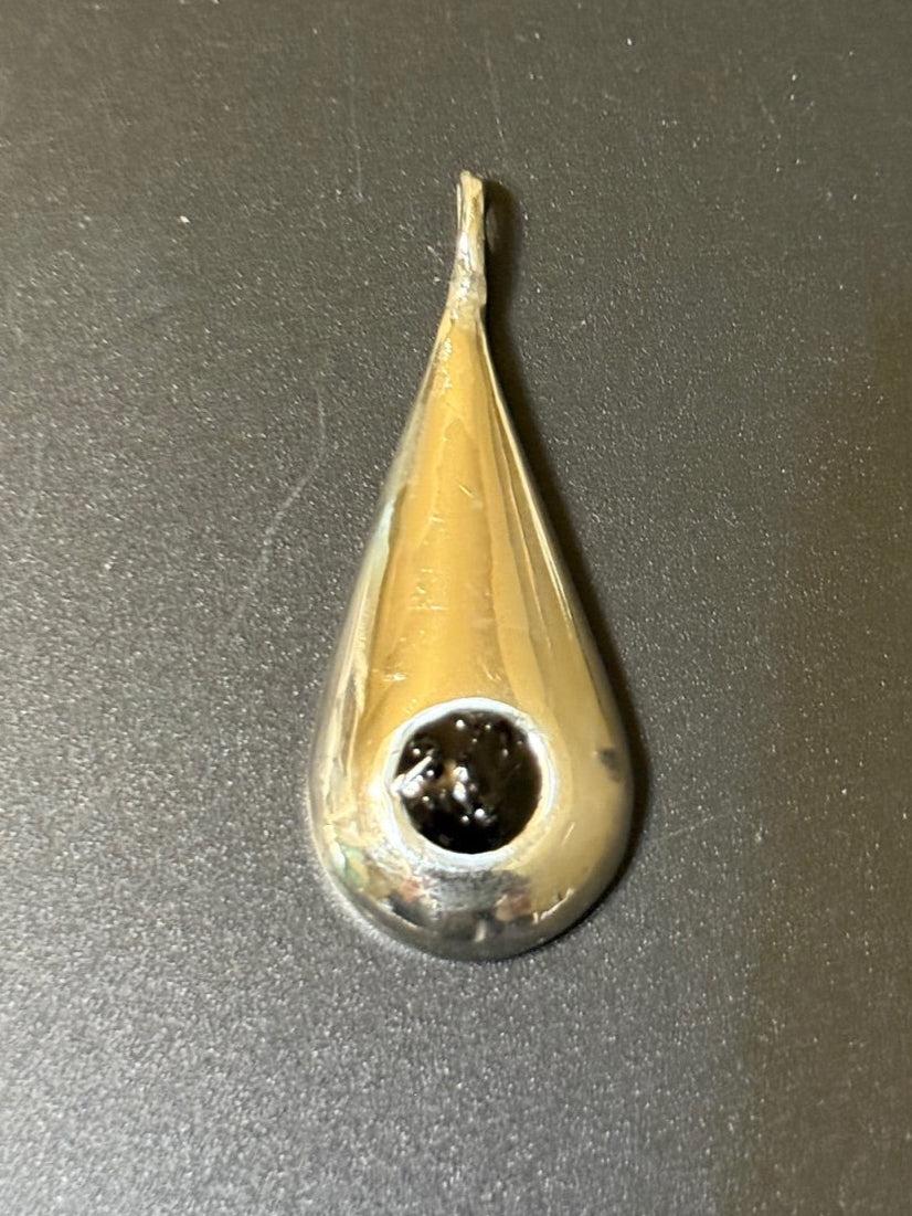 Handmade silver pendant with obsidian natural stone chips.