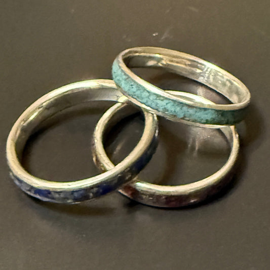 Three stackable rings with stone insets