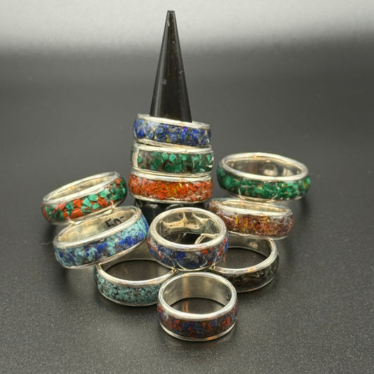 Sterling silver band rings with natural stones inset