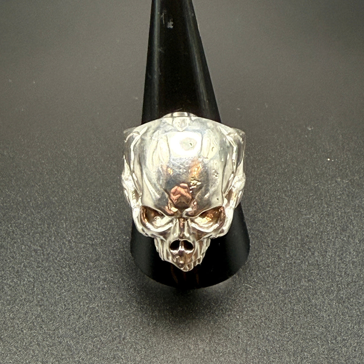 A silver skull ring