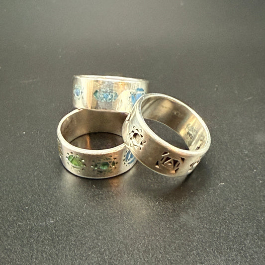 Sterling silver band ring with 1-7 Chakra symbols engraved into band and optionally colored and customized