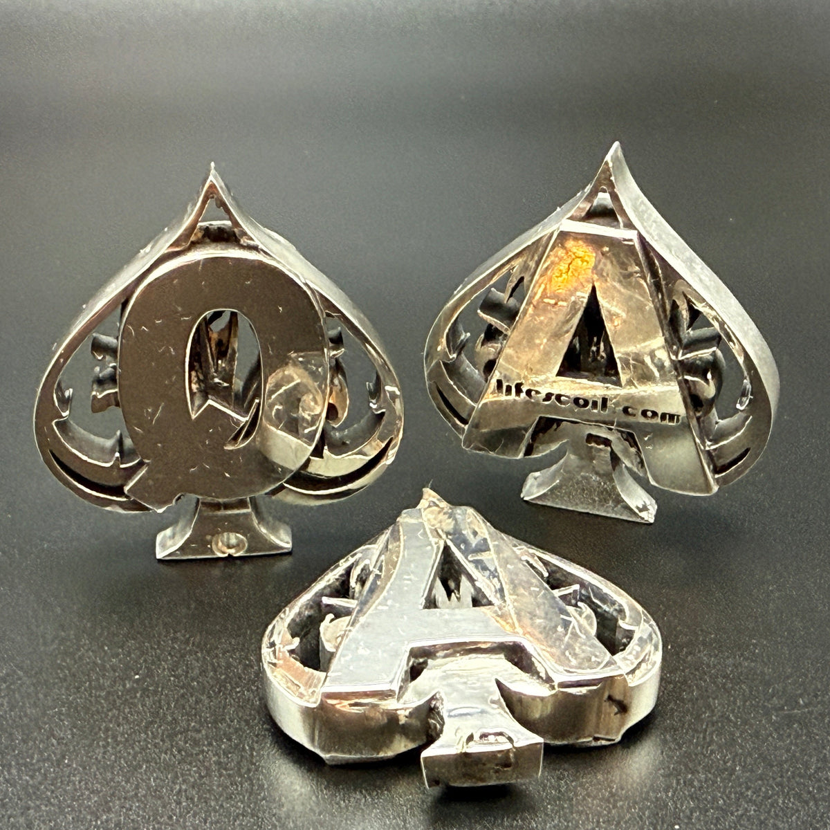 Favorite card made from more than an ounce of solid sterling silver. One customized with our website address.