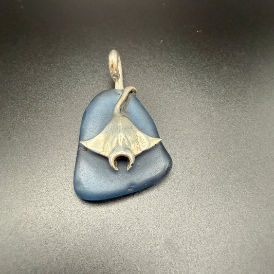Large blue sea glass pendant with sterling silver stingray charm