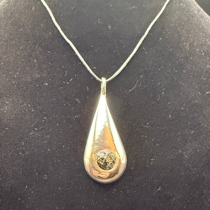 Handmade silver pendant with obsidian natural stone chips