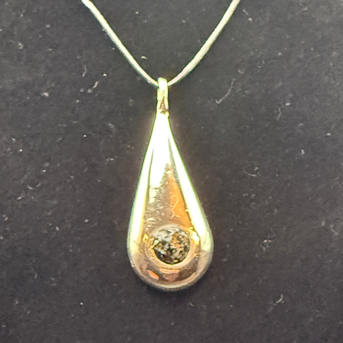 Handmade silver pendant with obsidian natural stone chips