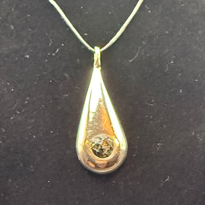 Handmade silver pendant with obsidian natural stone chips