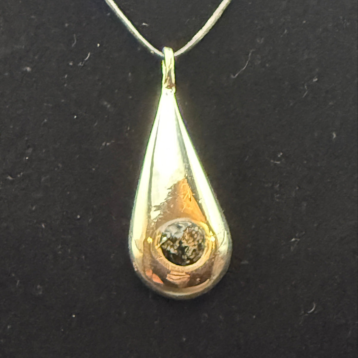 Handmade silver pendant with black obsidian natural stone chips