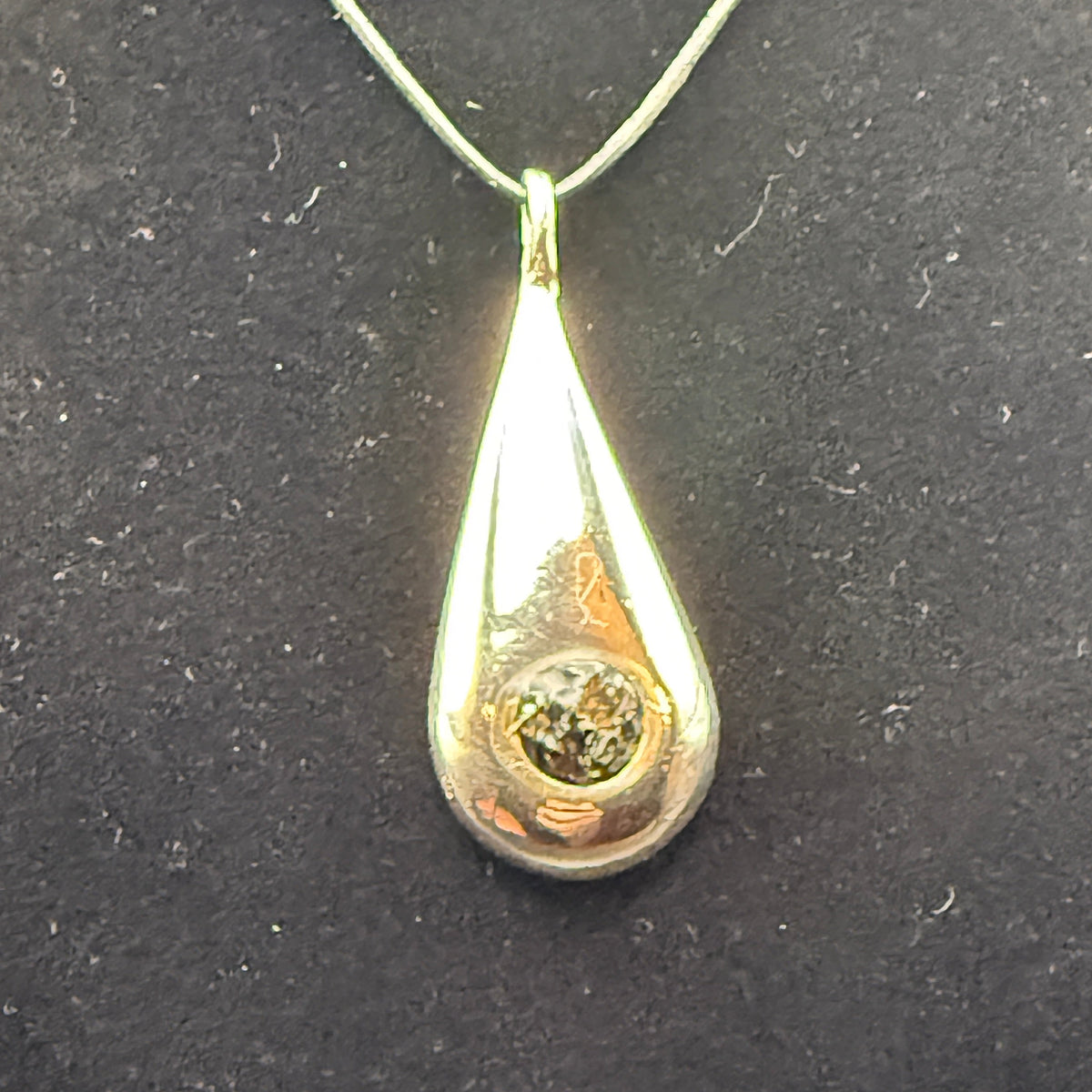 Handmade silver pendant with obsidian natural stone chips