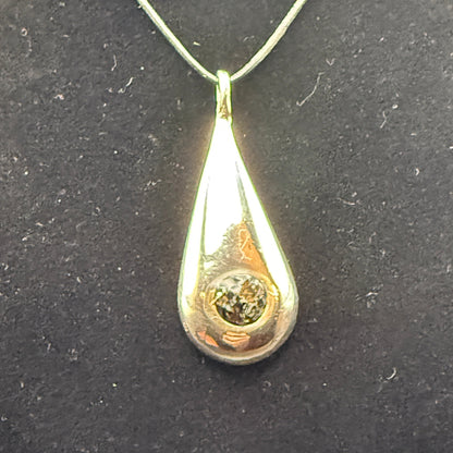 Handmade silver pendant with obsidian natural stone chips