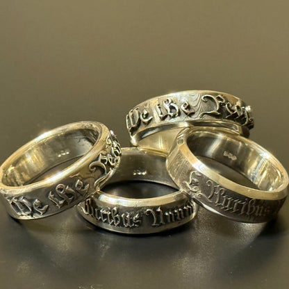 Embossed band ring