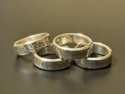 Collection of handmade engraved silver bands with USA Patriot Theme