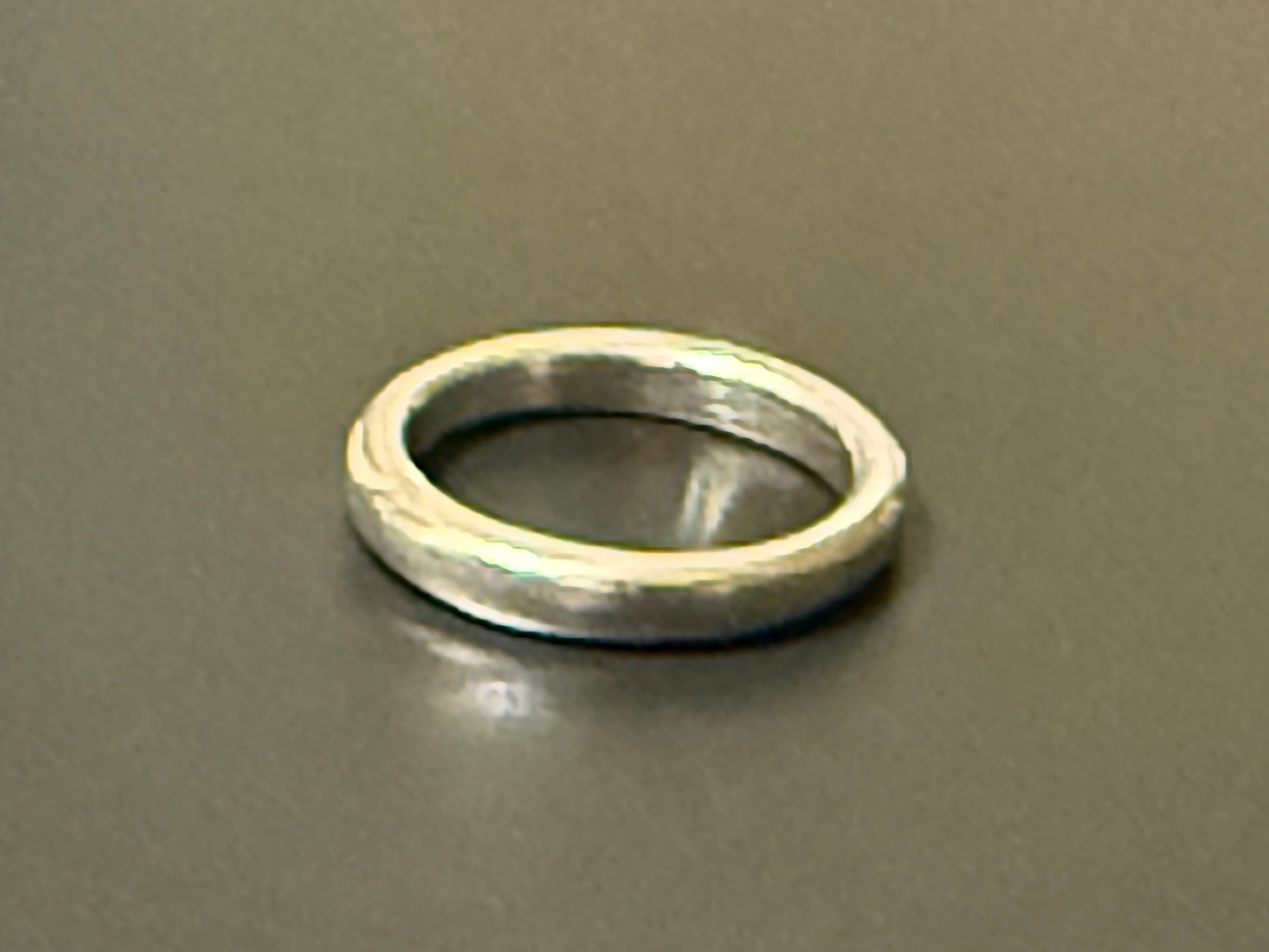 Handmade 2.5mm wide silver band with rounded top