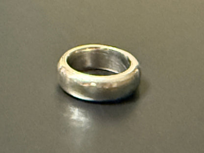 Handmade 5mm wide silver band with rounded top