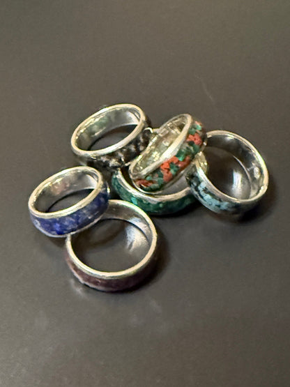Collection of handmade silver rings with one or two natural stones embedded in band