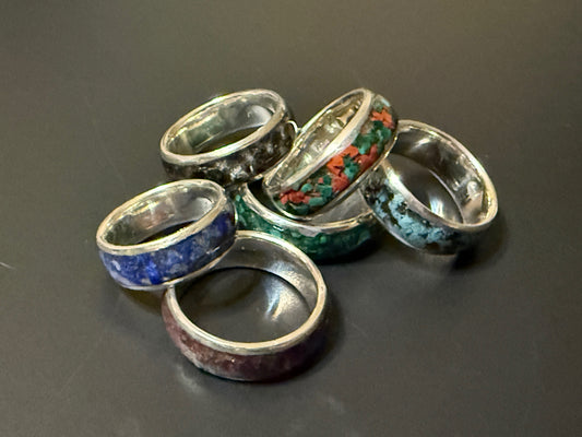 Collection of silver rings with one or two natural stones embedded in band