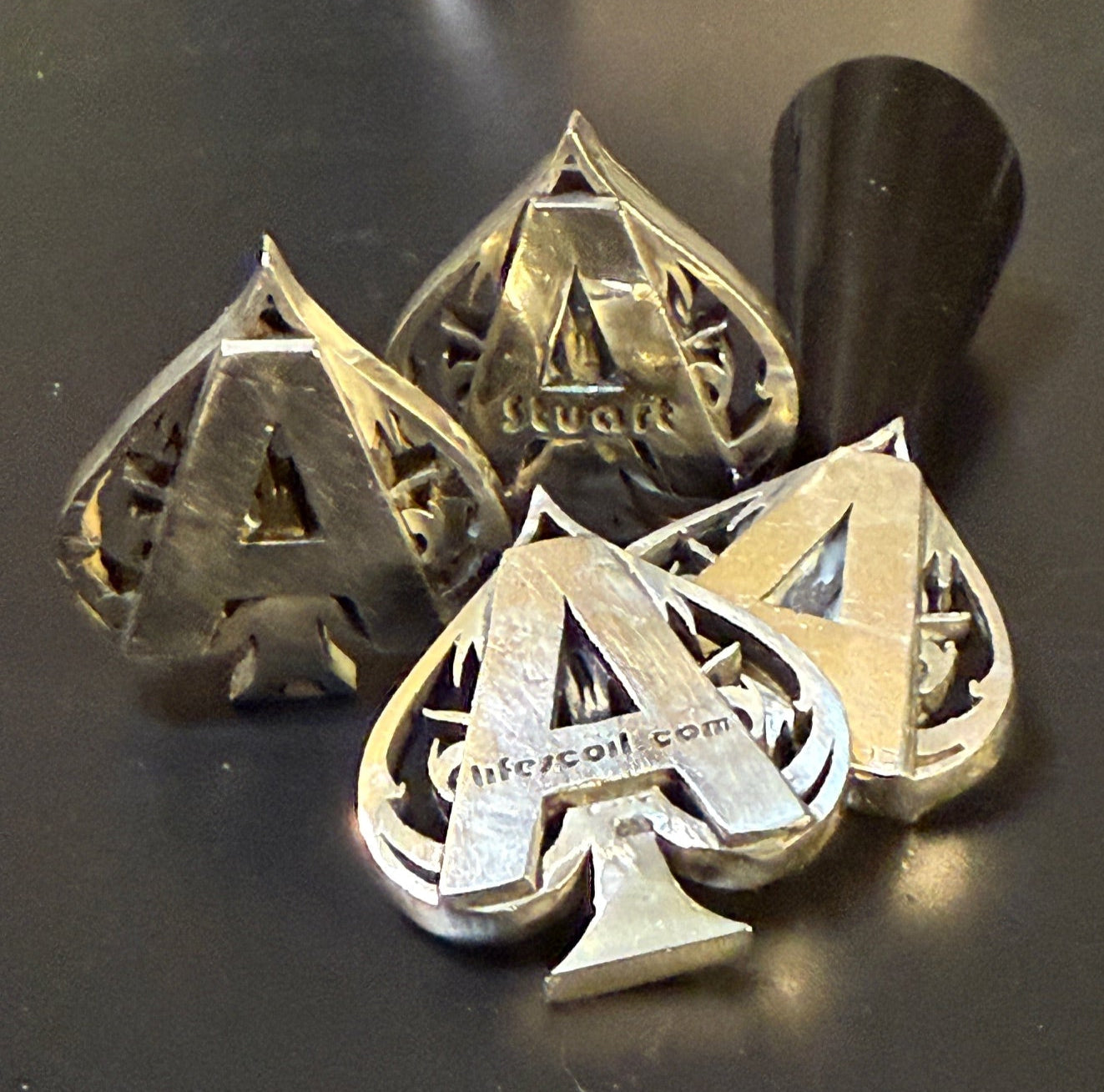 Four handmade silver ace of spades card protector some generic with no customization and others with custom text