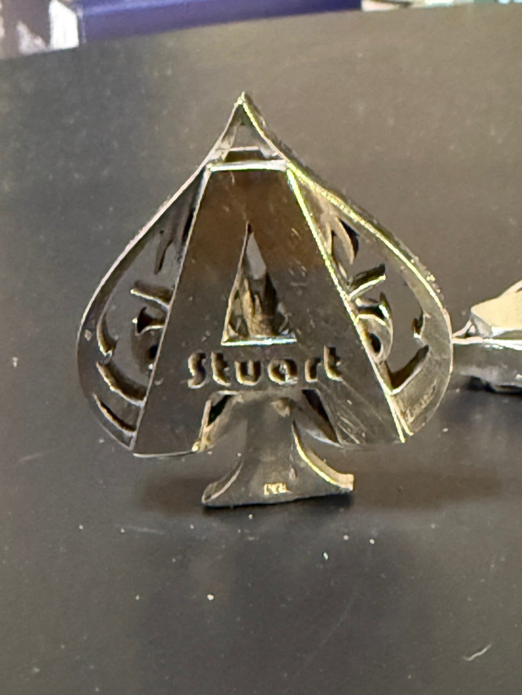 Handmade silver ace of spades card protector with owners name engraved on top