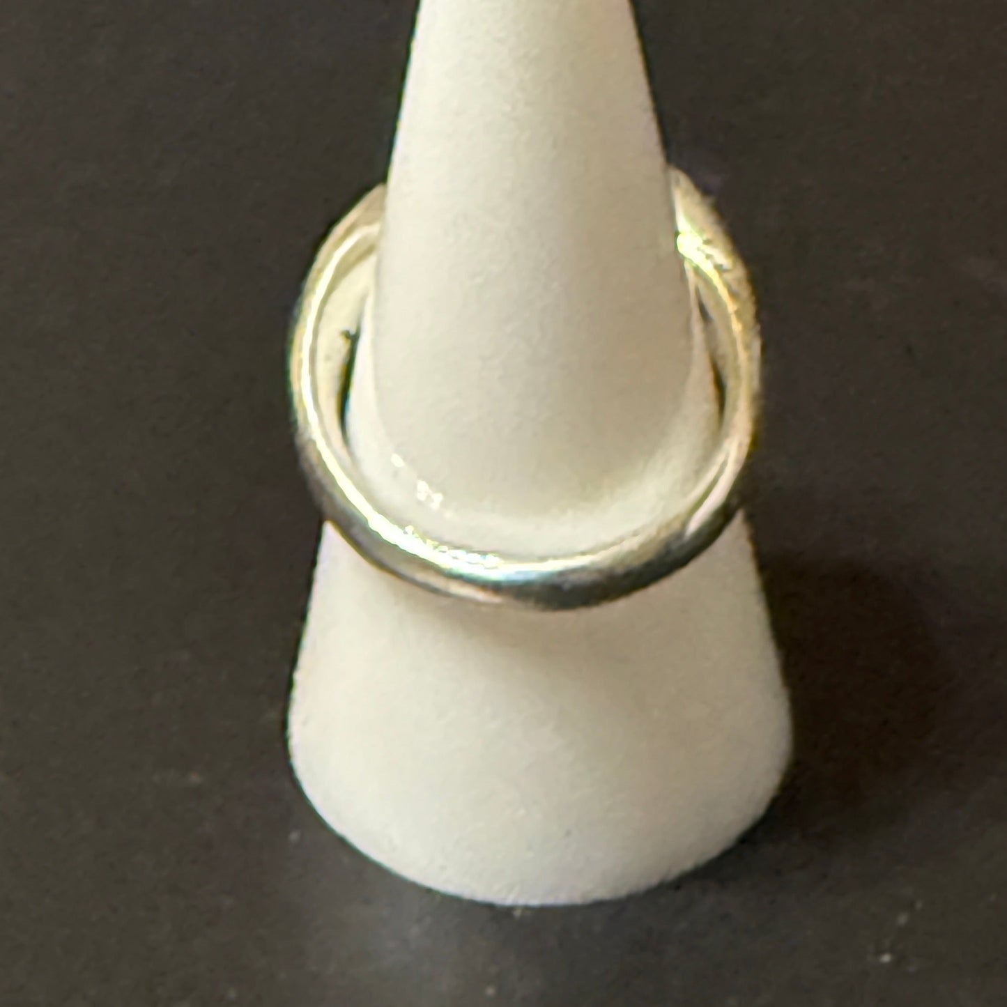 Silver barbell ring with tumbled tigers eye stone