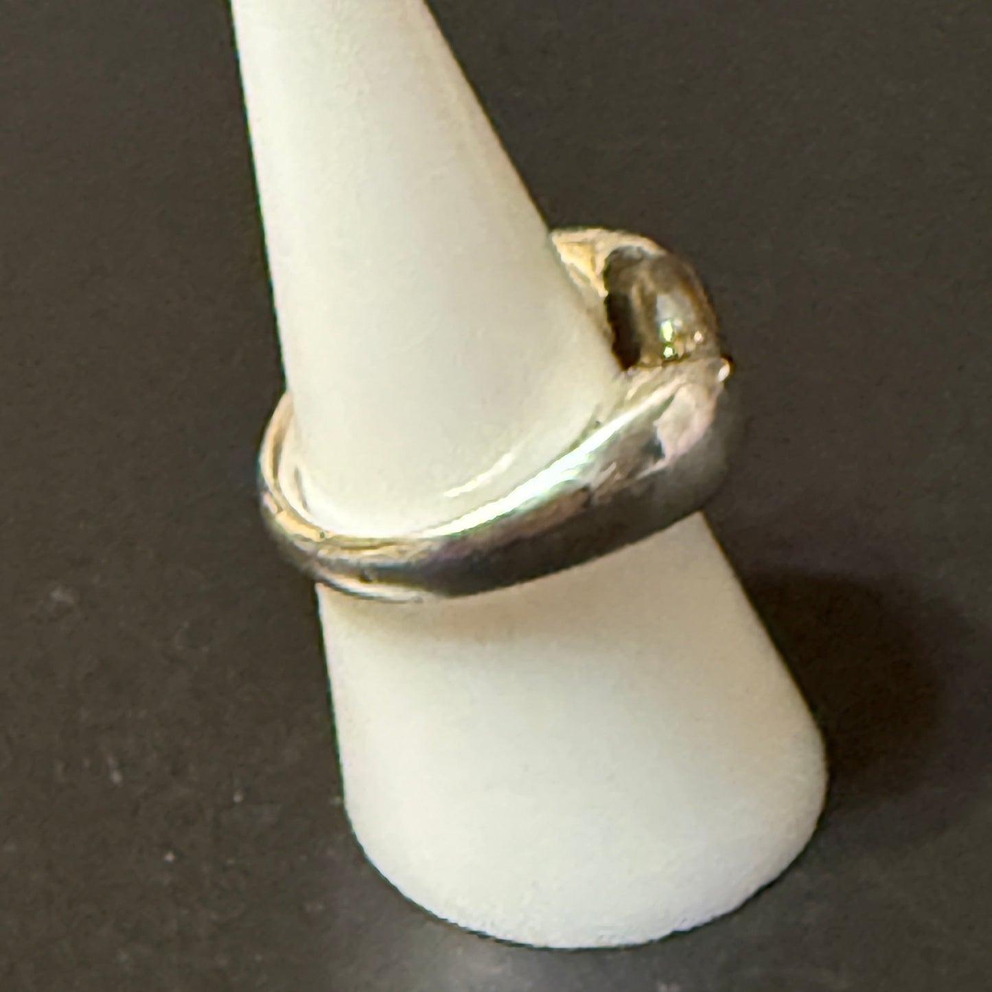 Silver barbell ring with tumbled tigers eye stone