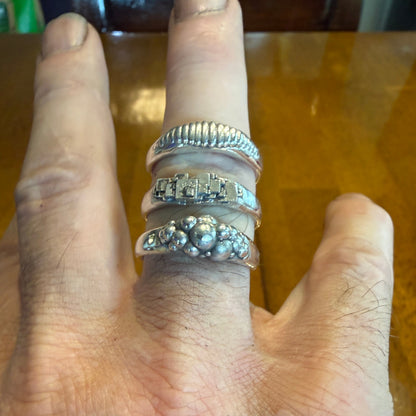 Ellipse, cube and sphere shapes clustered on narrow signet rings