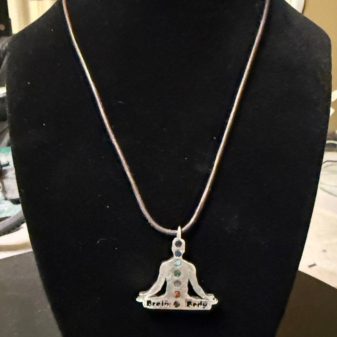 Chakra pendant with natural stone colors and custom engraving