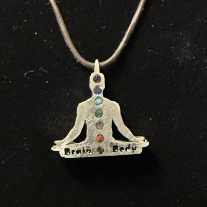 Chakra pendant with natural stone colors and custom engraving