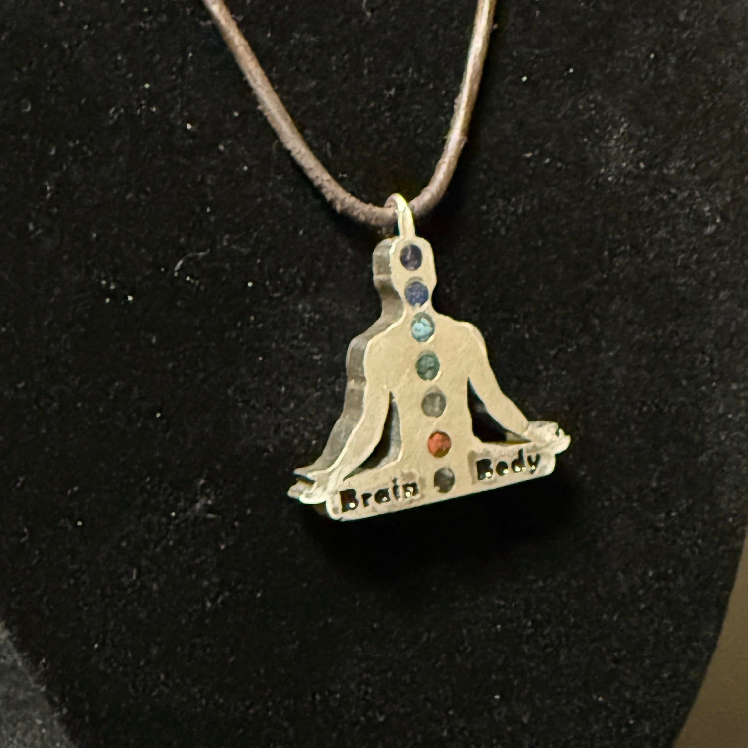 Chakra pendant with natural stone colors and custom engraving